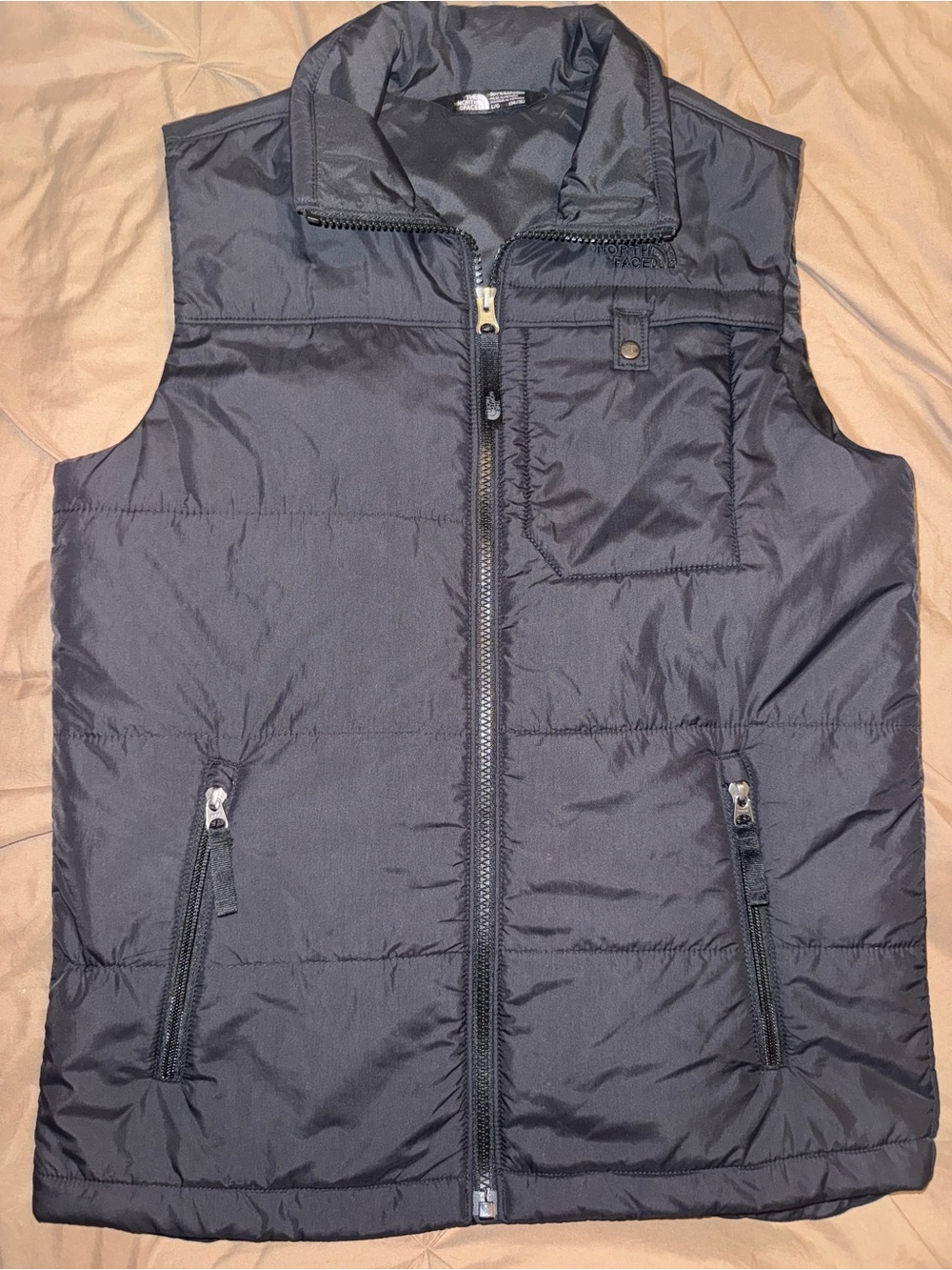 The north face vest kid’s large